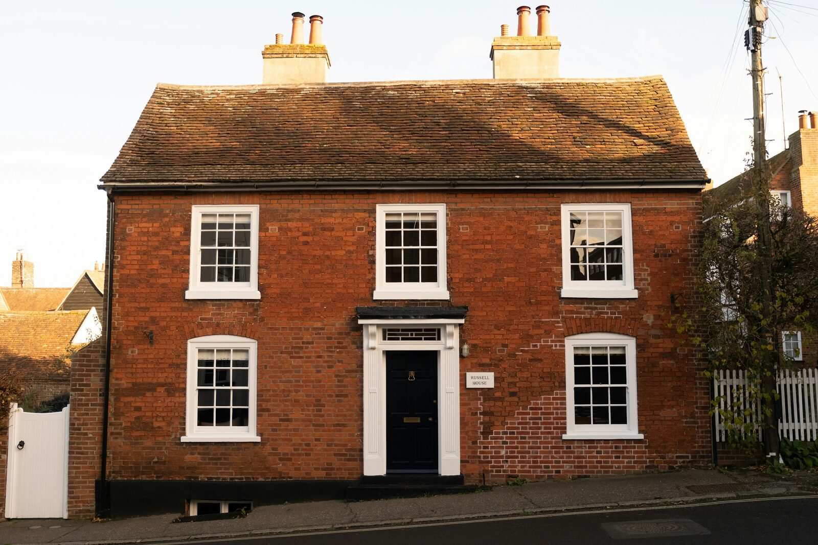 Traditional UK brick building with period windows and architectural details